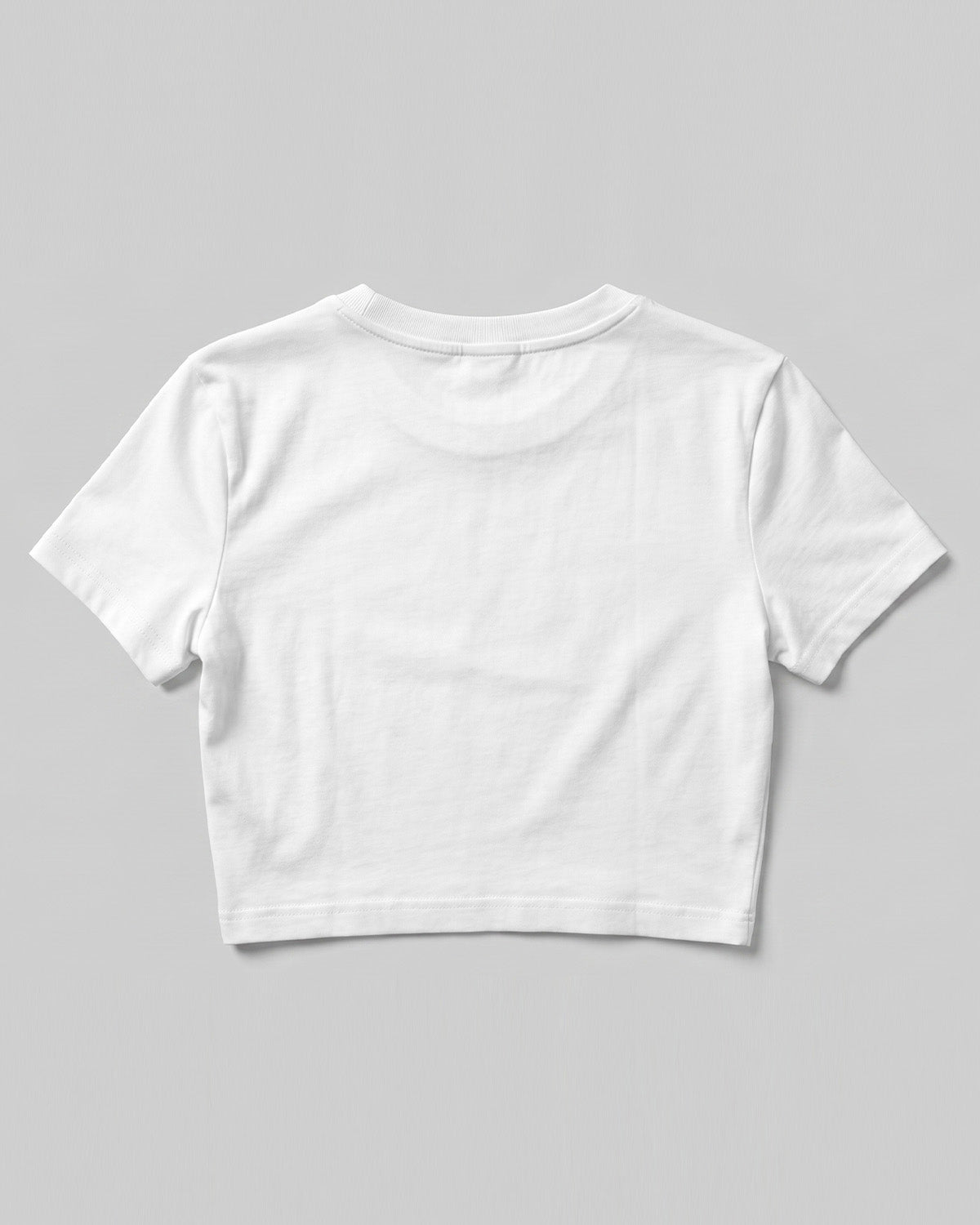 White plain crop top made from premium cotton, 180 GSM red label yarn, biowashed for softness and durability.